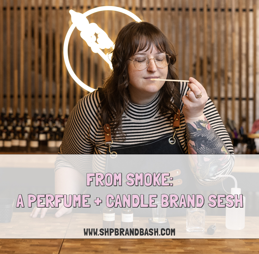 shop owner smells scent strip while making custom perfume scent